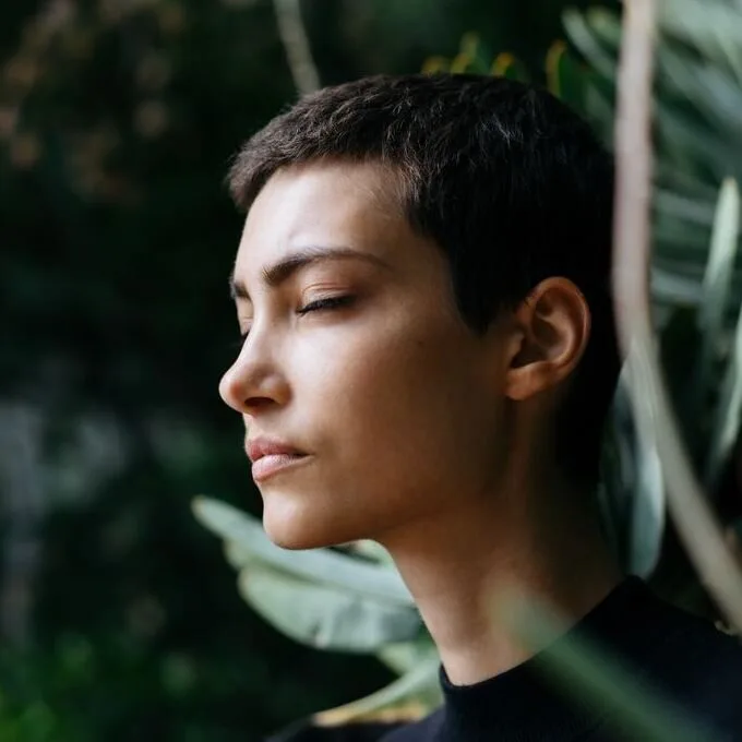 woman with eyes closed