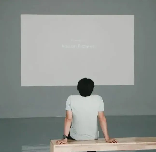 man watching presentation